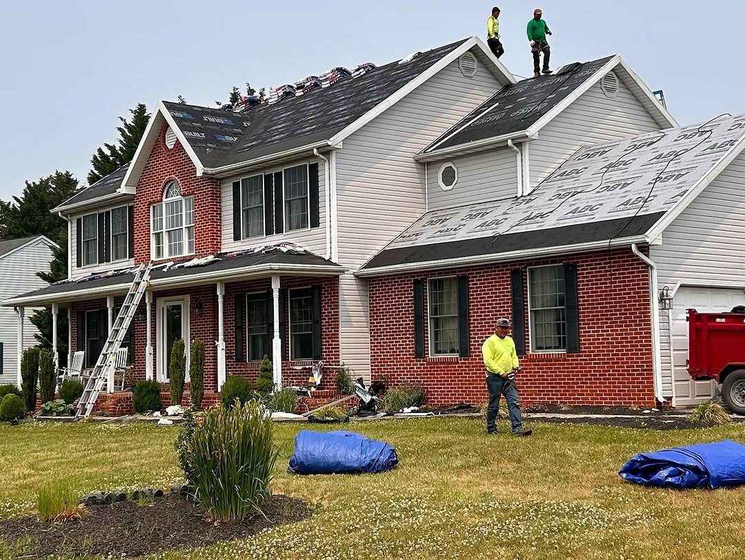 Storm-damaged asphalt shingle roof on a Maryland home, photographed by Supreme Restorations during the pre-inspection walkthrough that documents the loss for insurance claim filing
